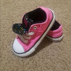 Pink slip on converse 7